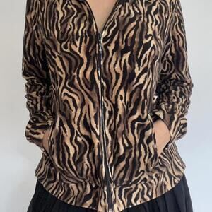 Brown and black zip-up jacket with a vintage vibe #y2k